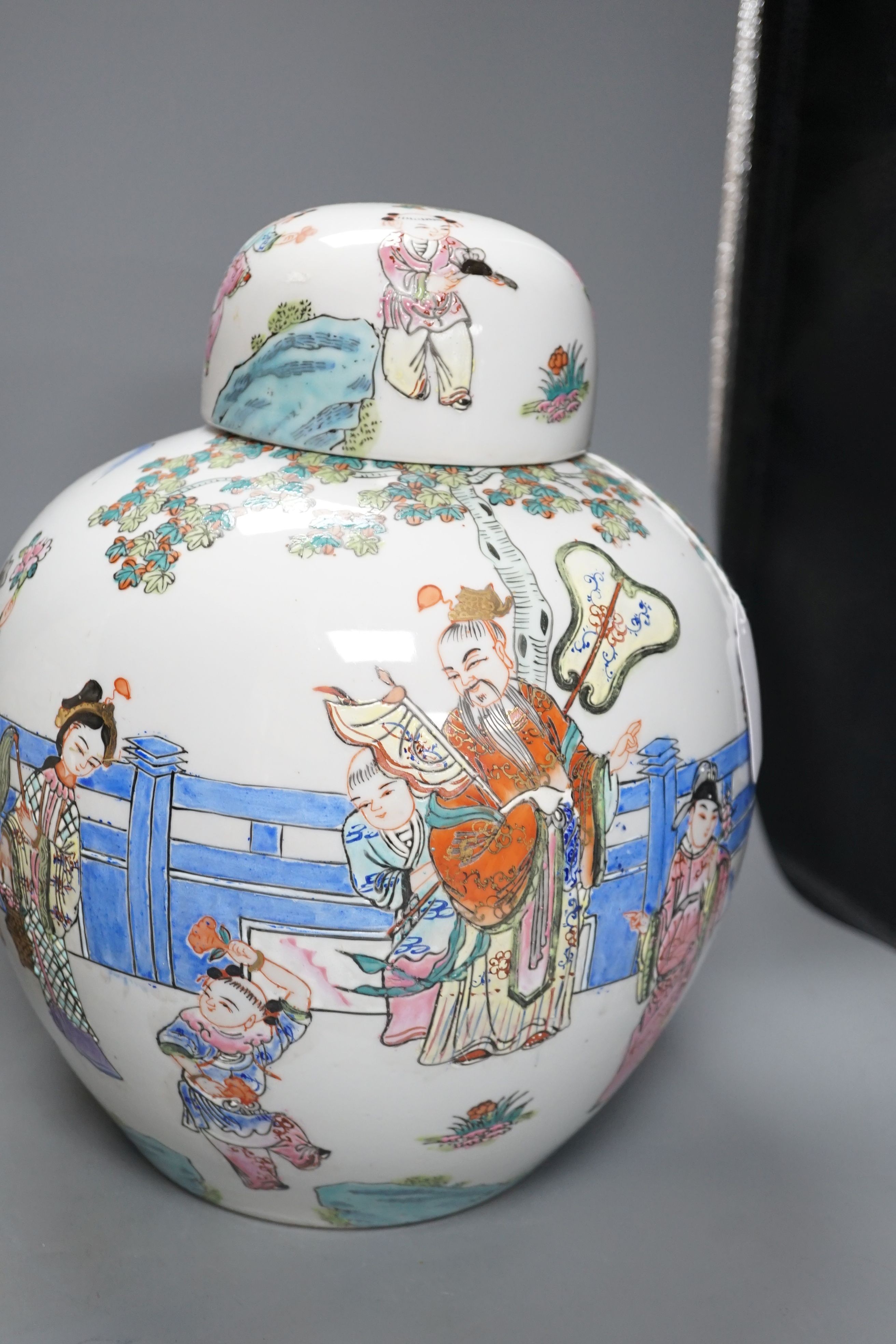 A Qingbai type bottle vase, a jar and cover, an apple green crackle glazed vase, a paper cut vase and a Song Dynasty style phoenix head bottle, tallest 38 cms high. (5)